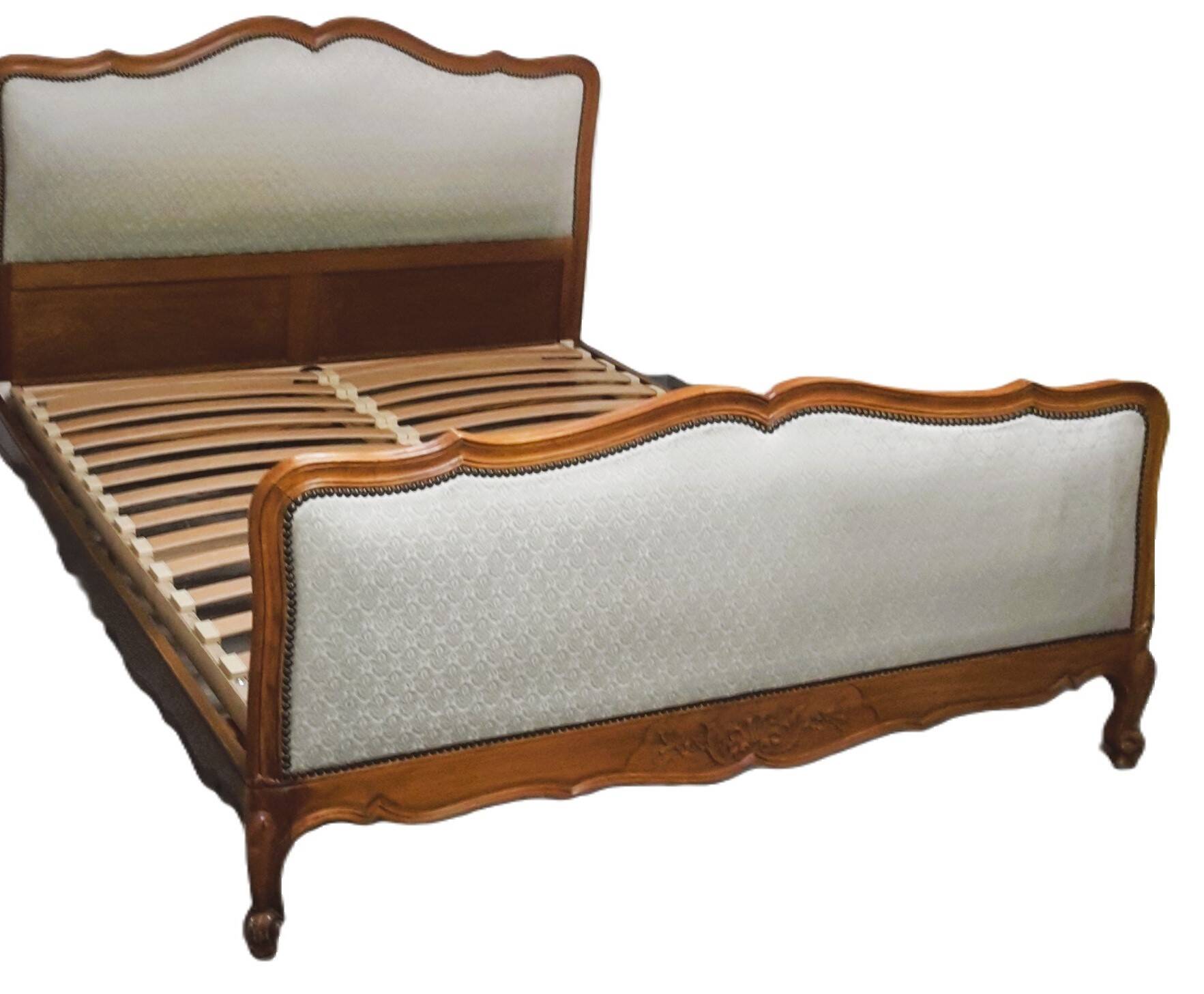 Cabinetmaker's bed frame and matching upholstered bedspread