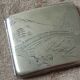 Old sterling silver cigarette case with Japanese decor