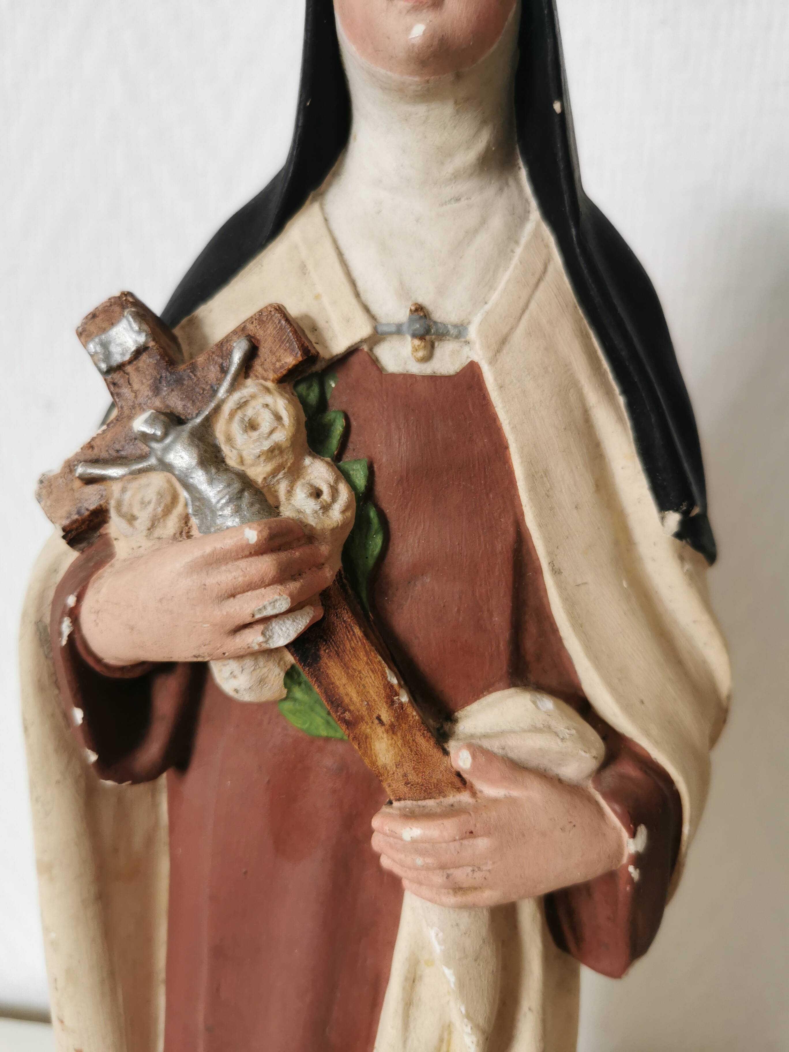 religious statue of Saint Therese of Lisieux in painted plaster