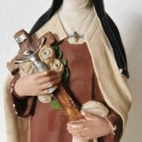 religious statue of Saint Therese of Lisieux in painted plaster