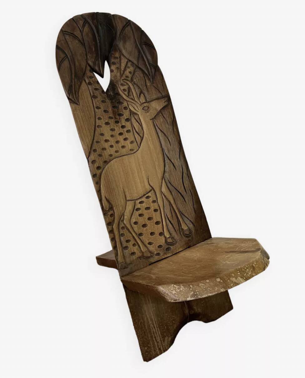 African carved wooden palaver chair
