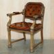 Fauteuil Chesterfield ancien restauré William IV en cuir