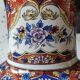 Vase balustre motifs paons/floraux style imari, signé y.p. derevua