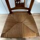 19th century straw chair with carved peacock back