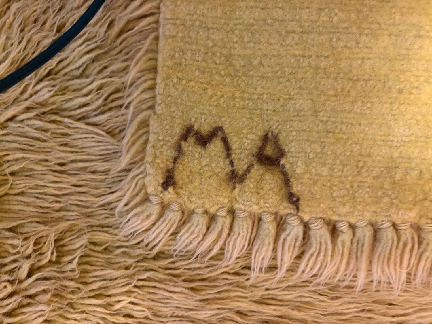 Large handmade wool rug from the 70s in lime green.