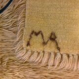 Large handmade wool rug from the 70s in lime green.