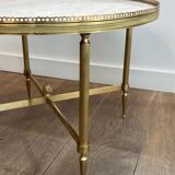 Neoclassical style round coffee table in brass with a white Carrara marble top from Jansen