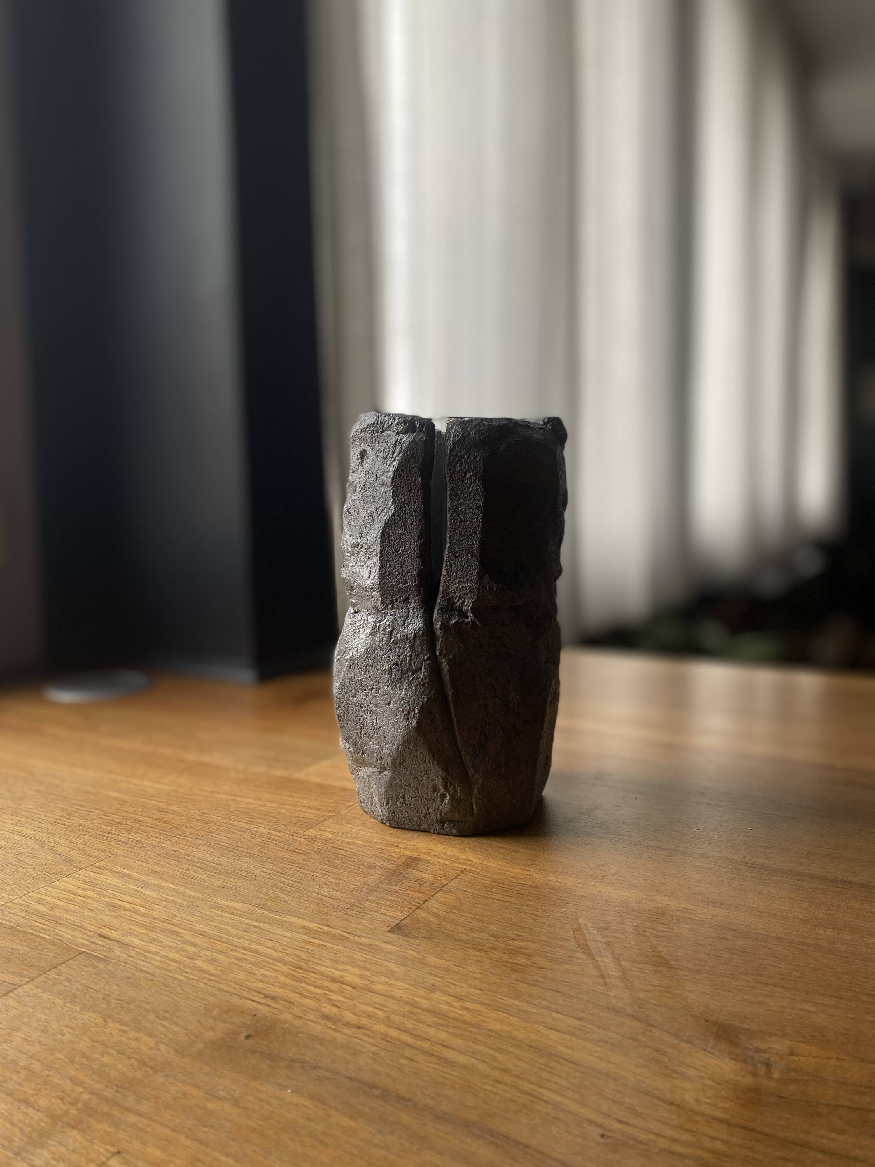 Sculpted concrete vase