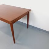 Vintage Scandinavian style dining table from the 50s and 60s in teak with extensions