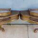 Golden patinated wall consoles