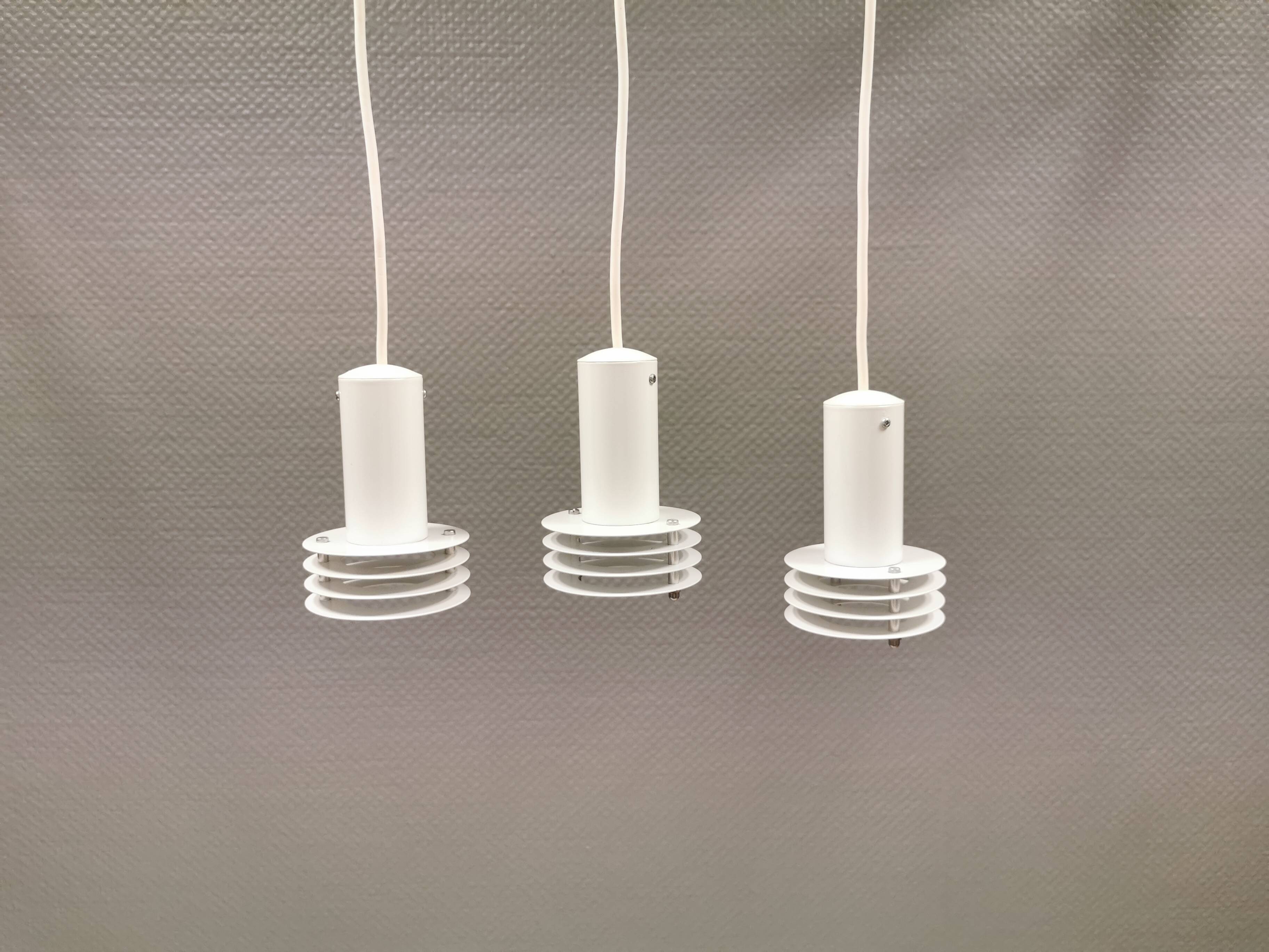 3 minimalistic small hanging lamps from danish lyfa, produced in the 80s.