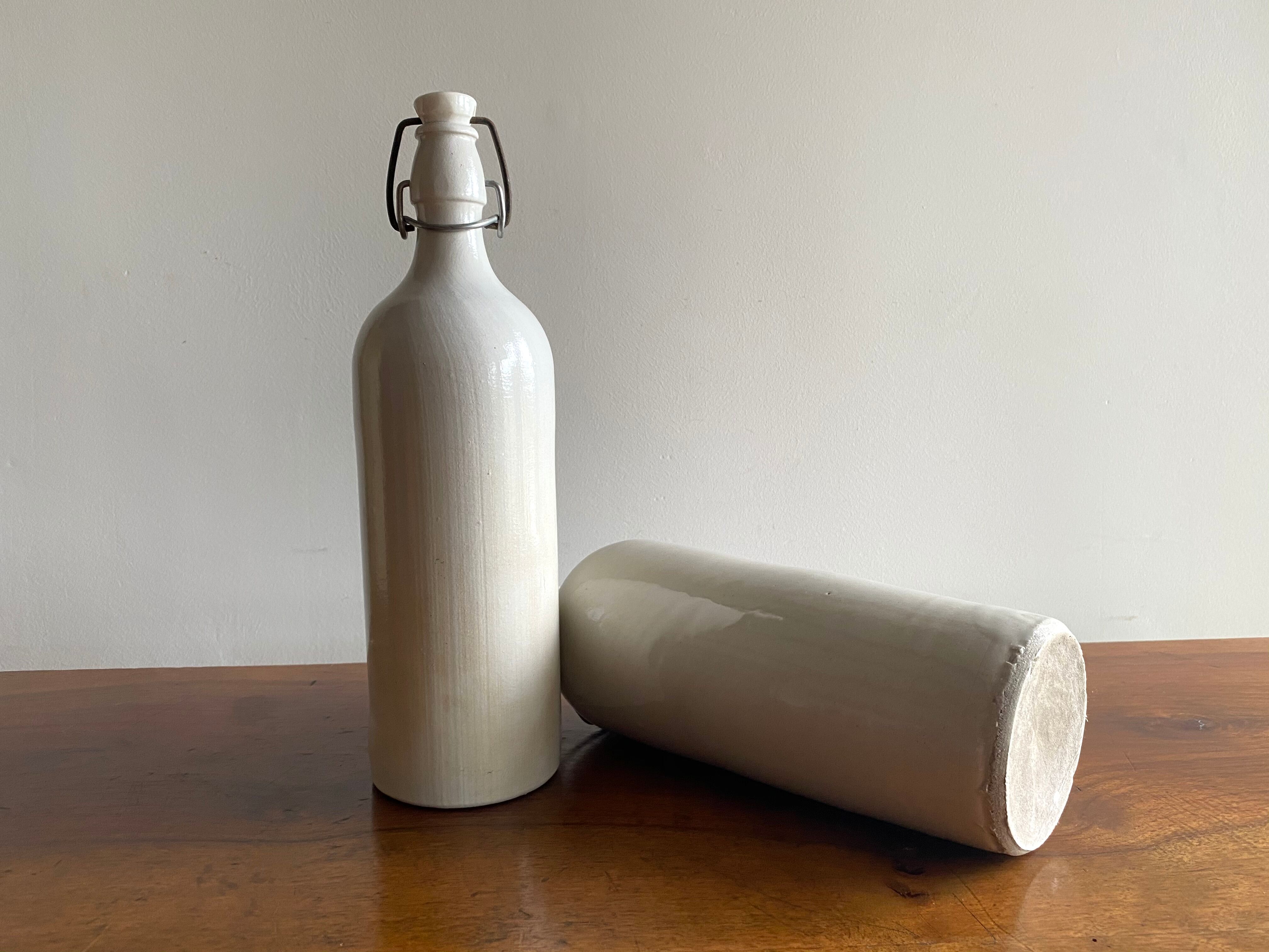 Set of 2 old bottles in glazed stoneware