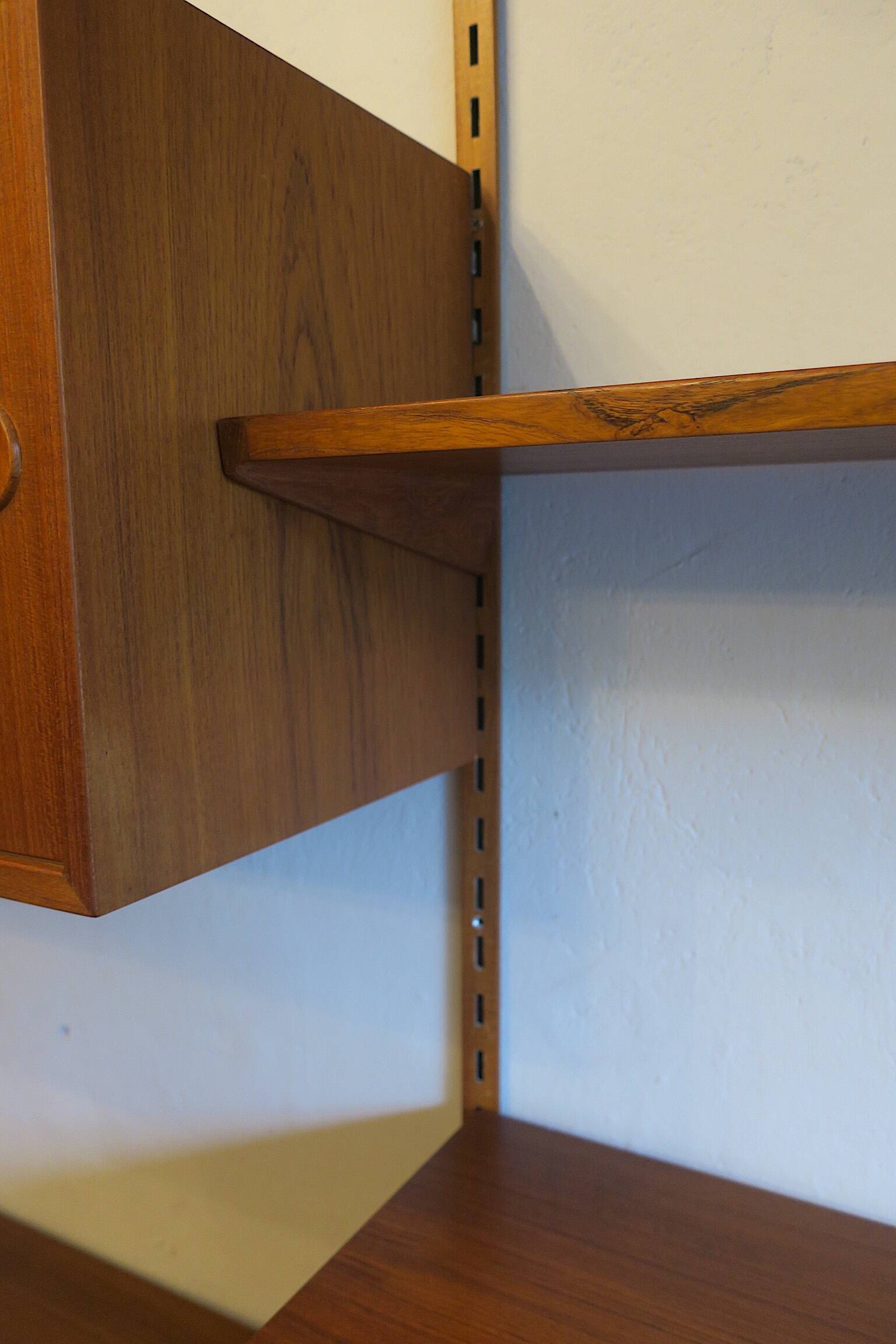 Modular 3-compartment teak wall shelving system with desk and lighting by Kai Kristiansen for FM, Denmark, 1960s