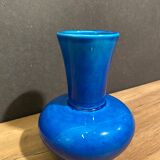 Signed vase in turquoise blue earthenware