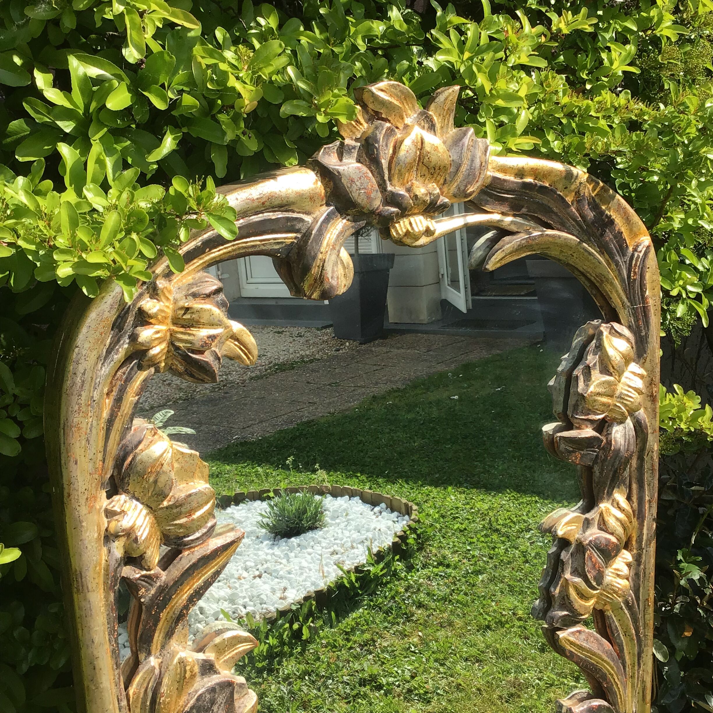 Glace en bois sculpté 130x64cm