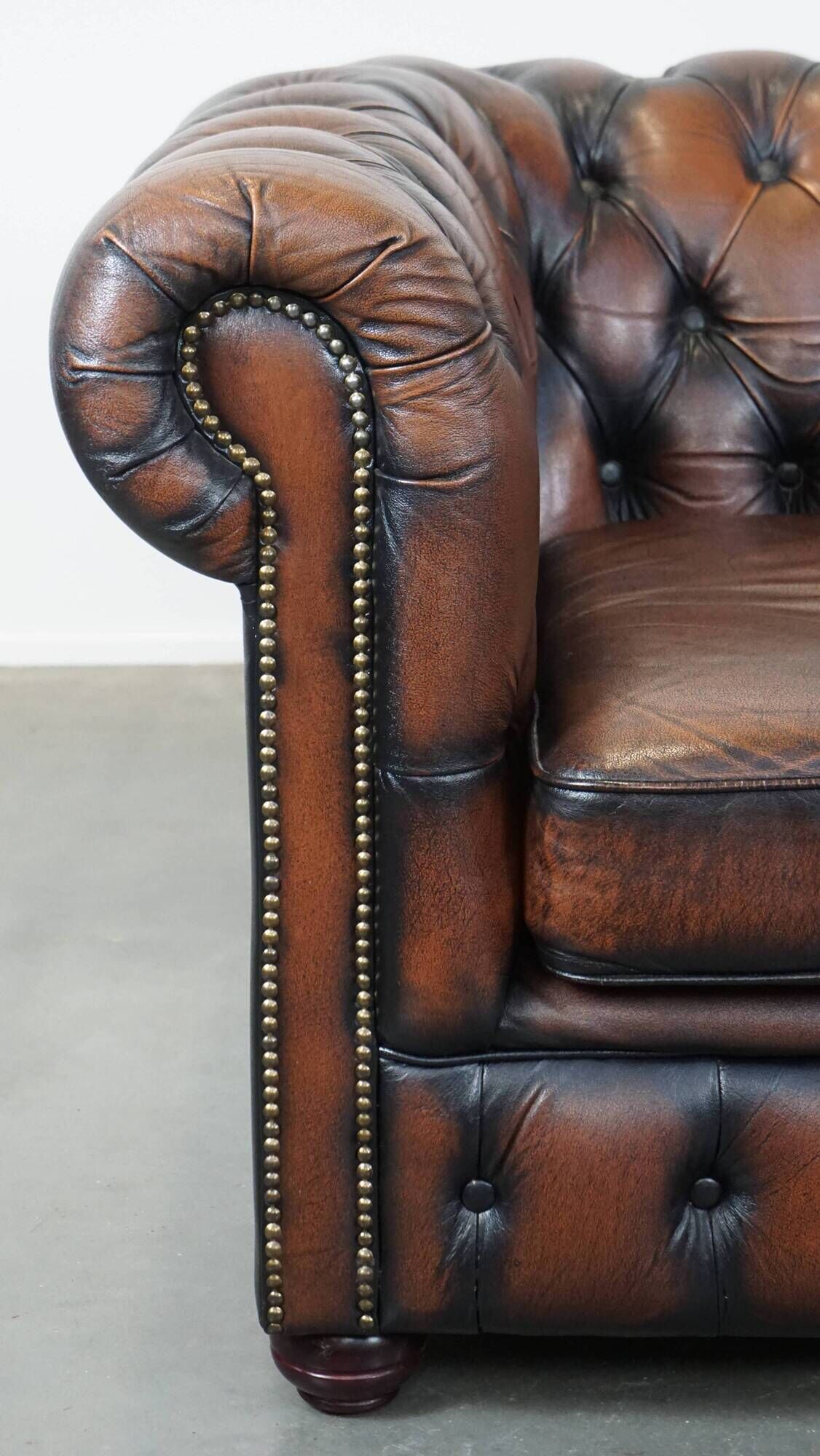 Classic English Chesterfield 2.5 seater sofa in brown cowhide