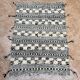 Small black Moroccan Berber Zanafi kilim rug for bedroom and living room.