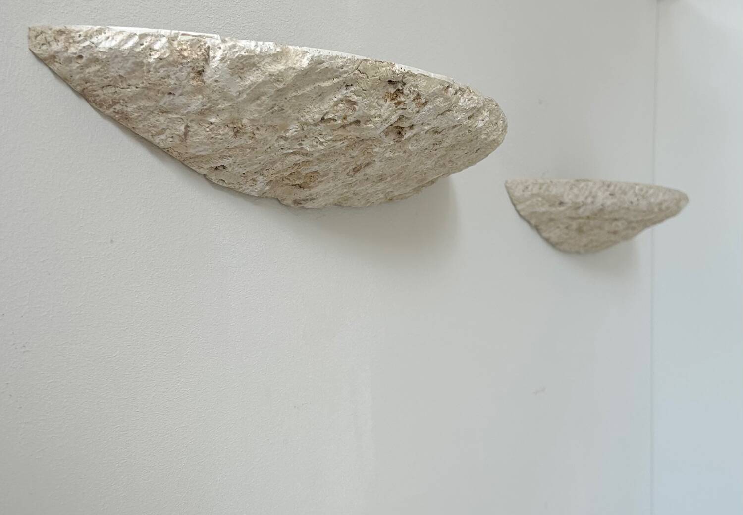 Pair of vintage stone sconces, natural beige, Italy 1979