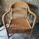 Vintage colonial lounge chair in rattan, pre-1950s.