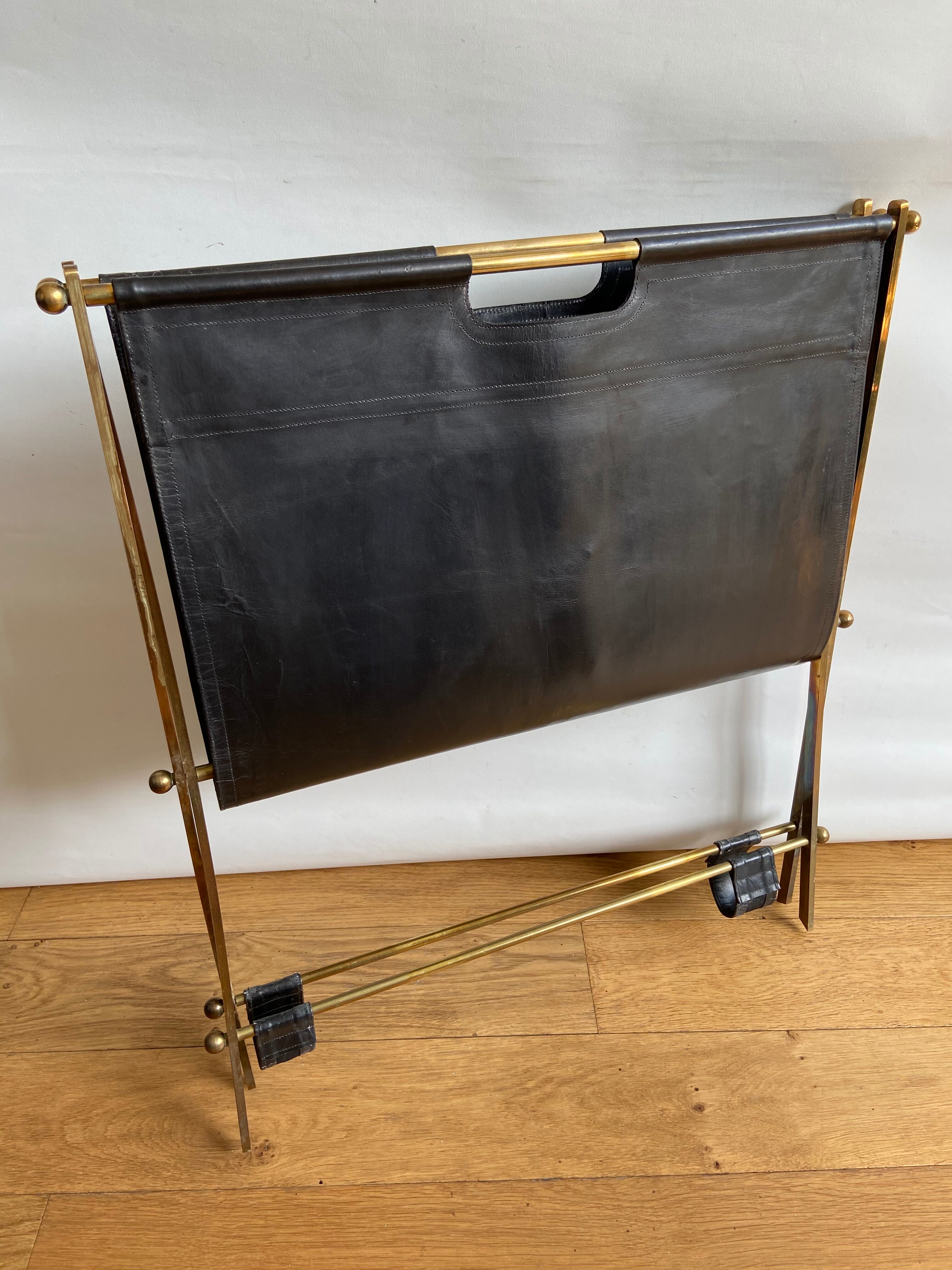 Leather and gilded brass magazine holder