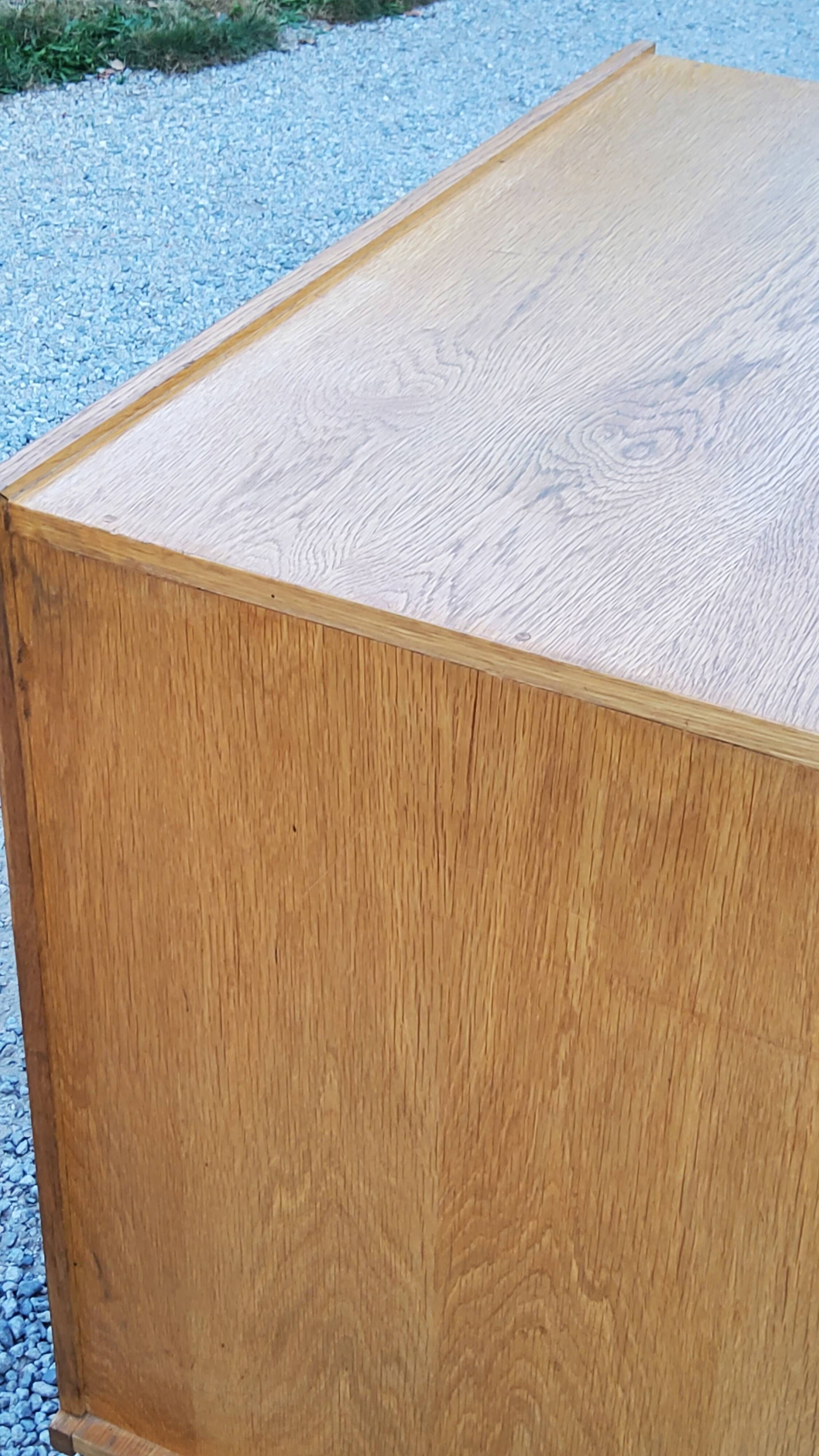 Vintage store chest of drawers in blond oak metal tube legs 4 drawers