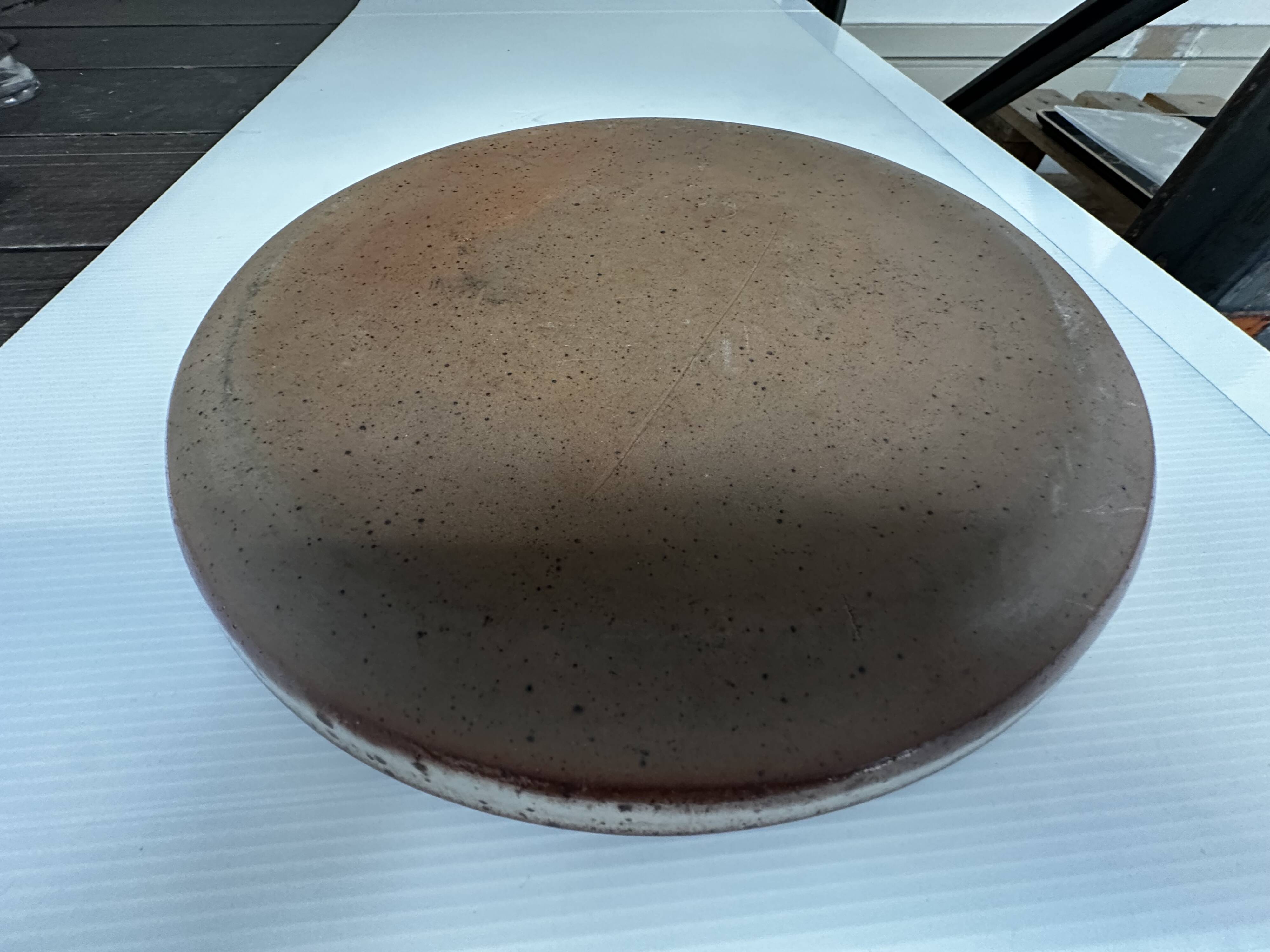 Large round stoneware dish signed Vallauris origin Diameter 30 cm