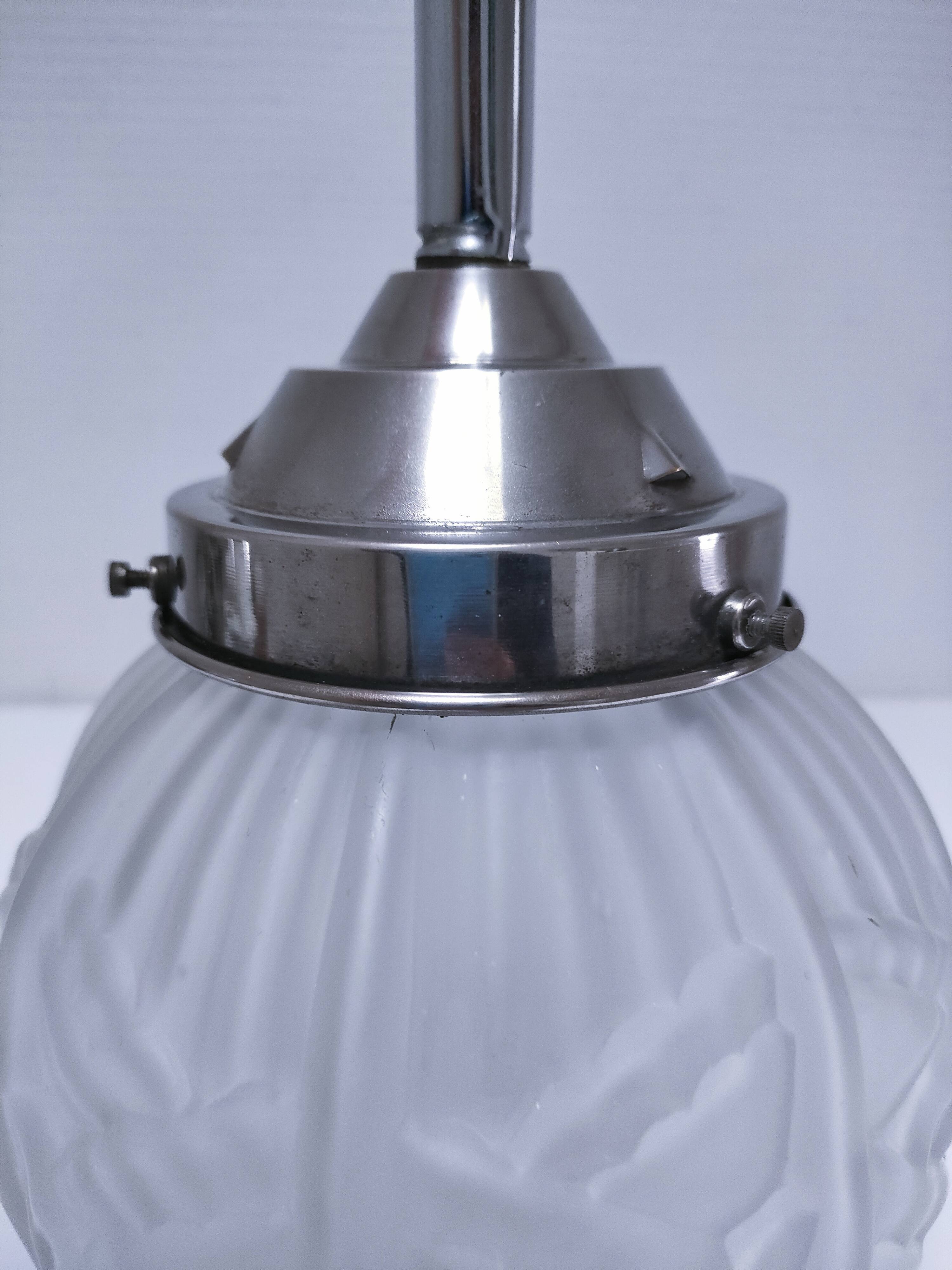 art deco pendant light with molded glass and chrome-plated metal frame