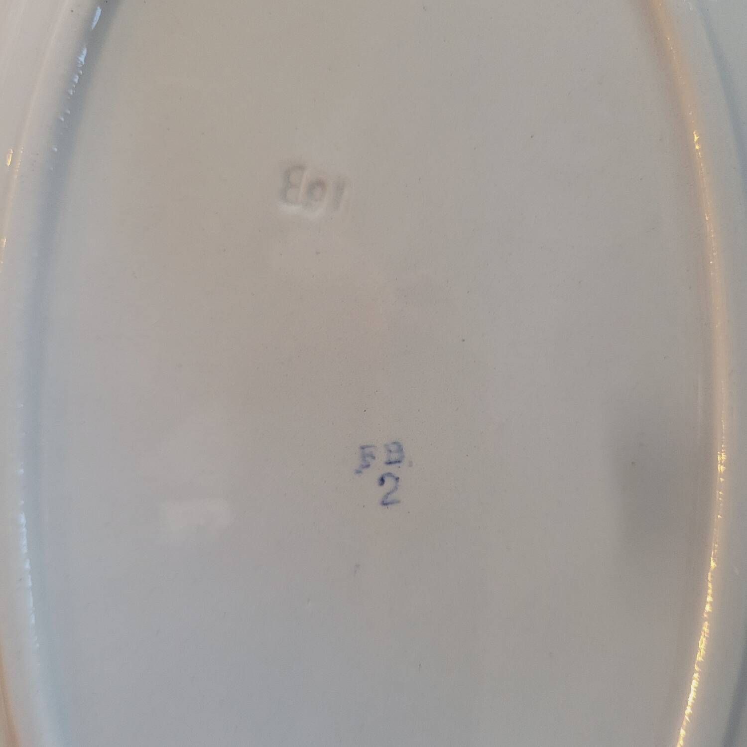 Oval dish with red floral decoration from the 40s