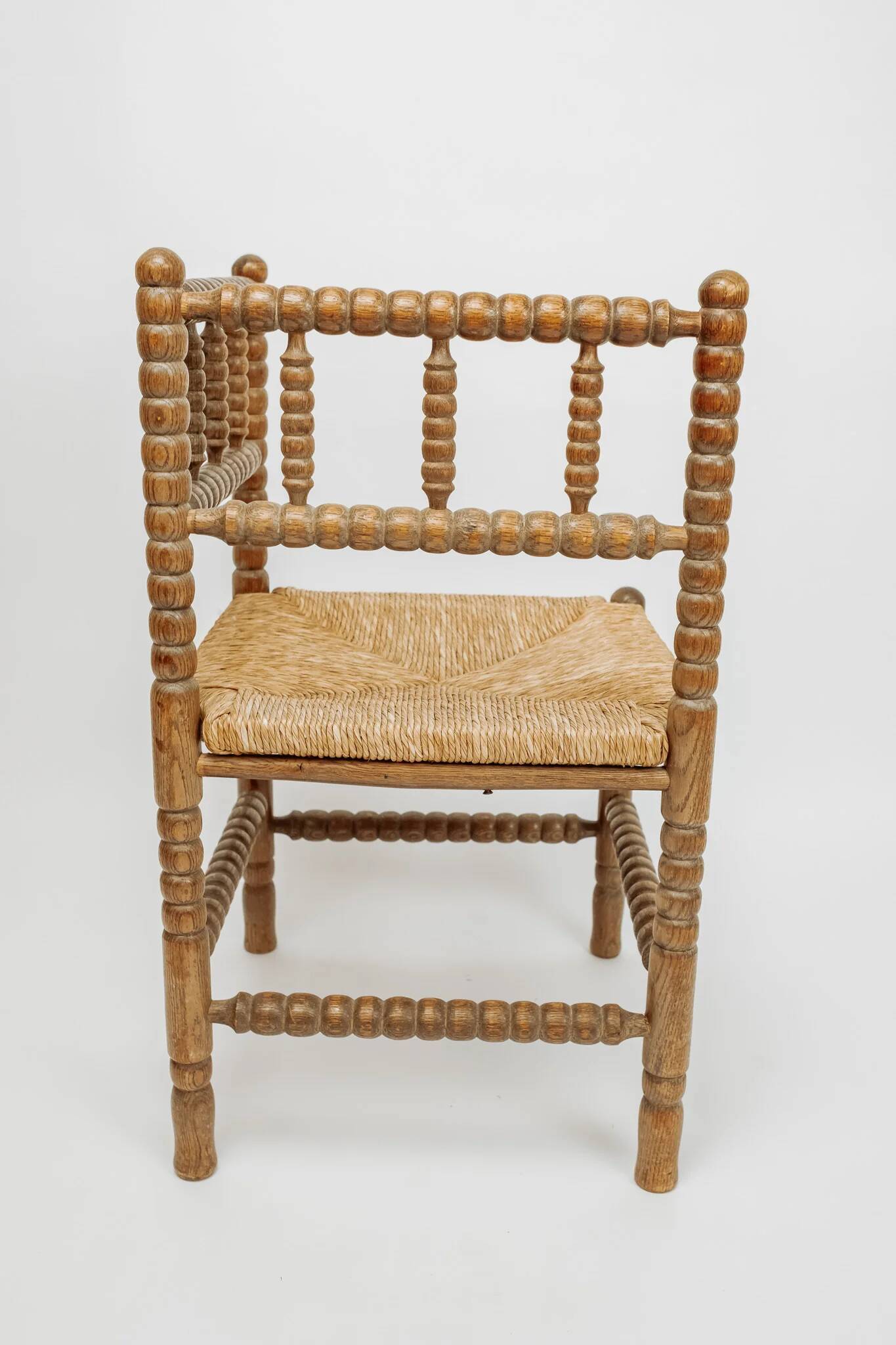 Classic vintage bobbin corner armchair