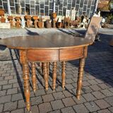 12-foot round oak table with 7 extensions / 20 people