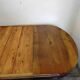 Oval wooden table with extensions