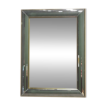 Miroir « Disco » DeKnudt des années 1980, avec cadre biseauté à plusieurs niveaux et bordure dorée.