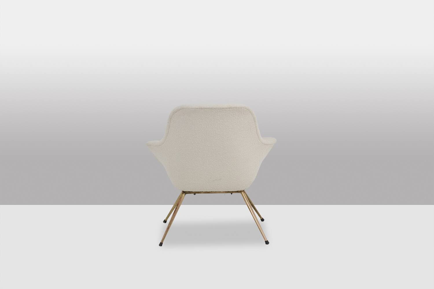 Pair of cocktail armchairs in gilded brass. 1960s.