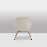 Pair of cocktail armchairs in gilded brass. 1960s.