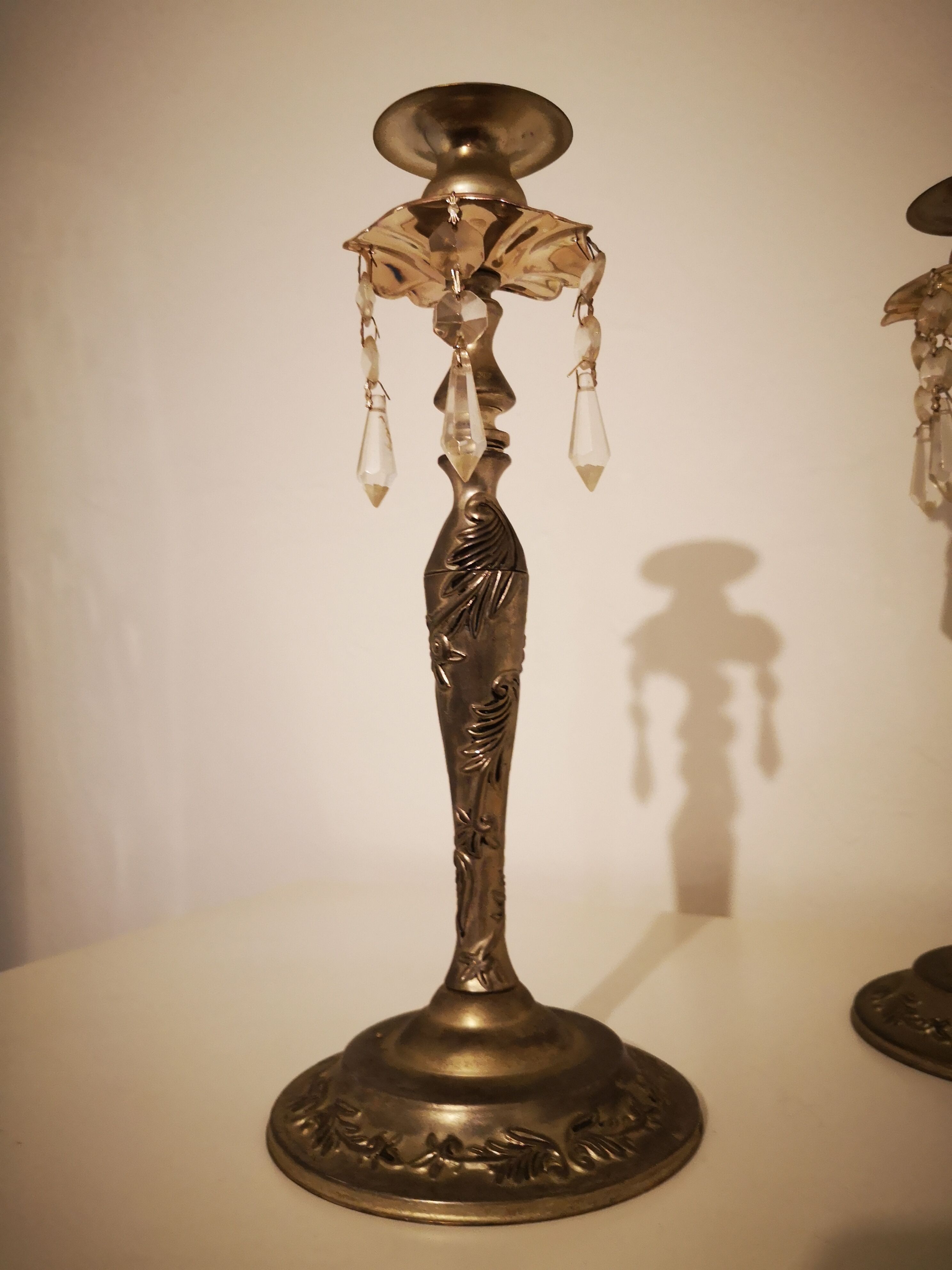 Set of 2 metal candlesticks with stamps