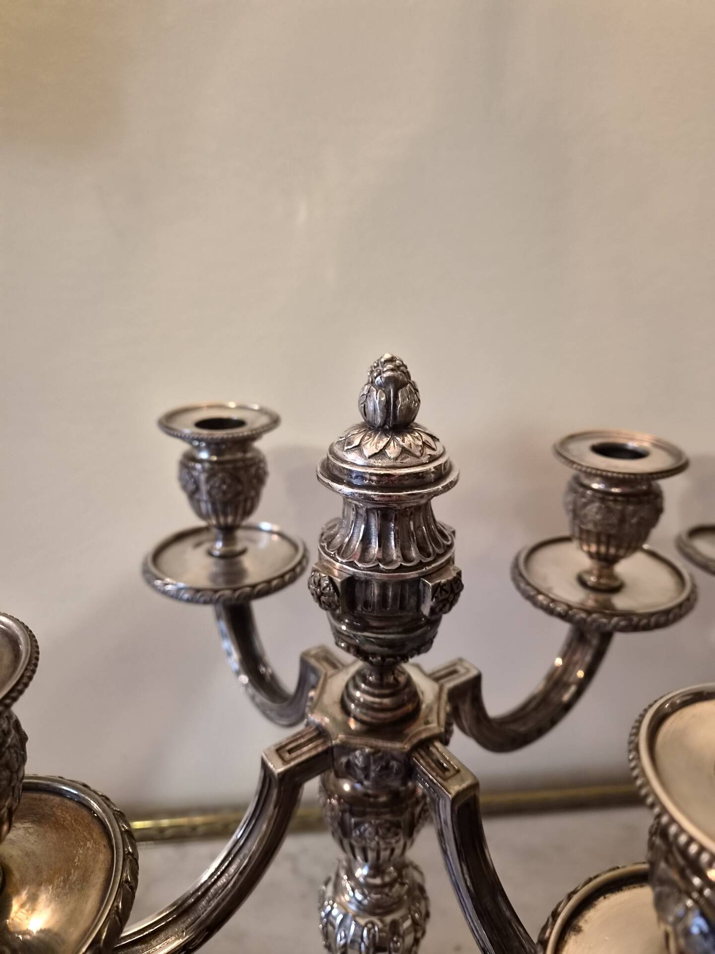Pair of four-light candelabra in silver-plated metal in Louis style.