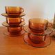 5 tasses et 5 soucoupes  couleur orange, brun