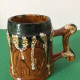 Polychrome ceramic beer mug with fat lava effect