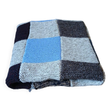 Hand knitted patchwork plaid