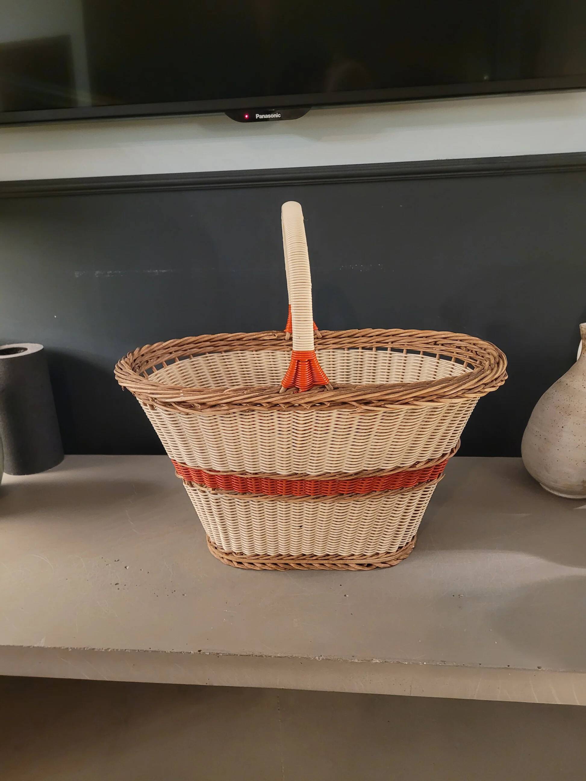 Old oval basket with a wooden base