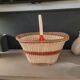Old oval basket with a wooden base
