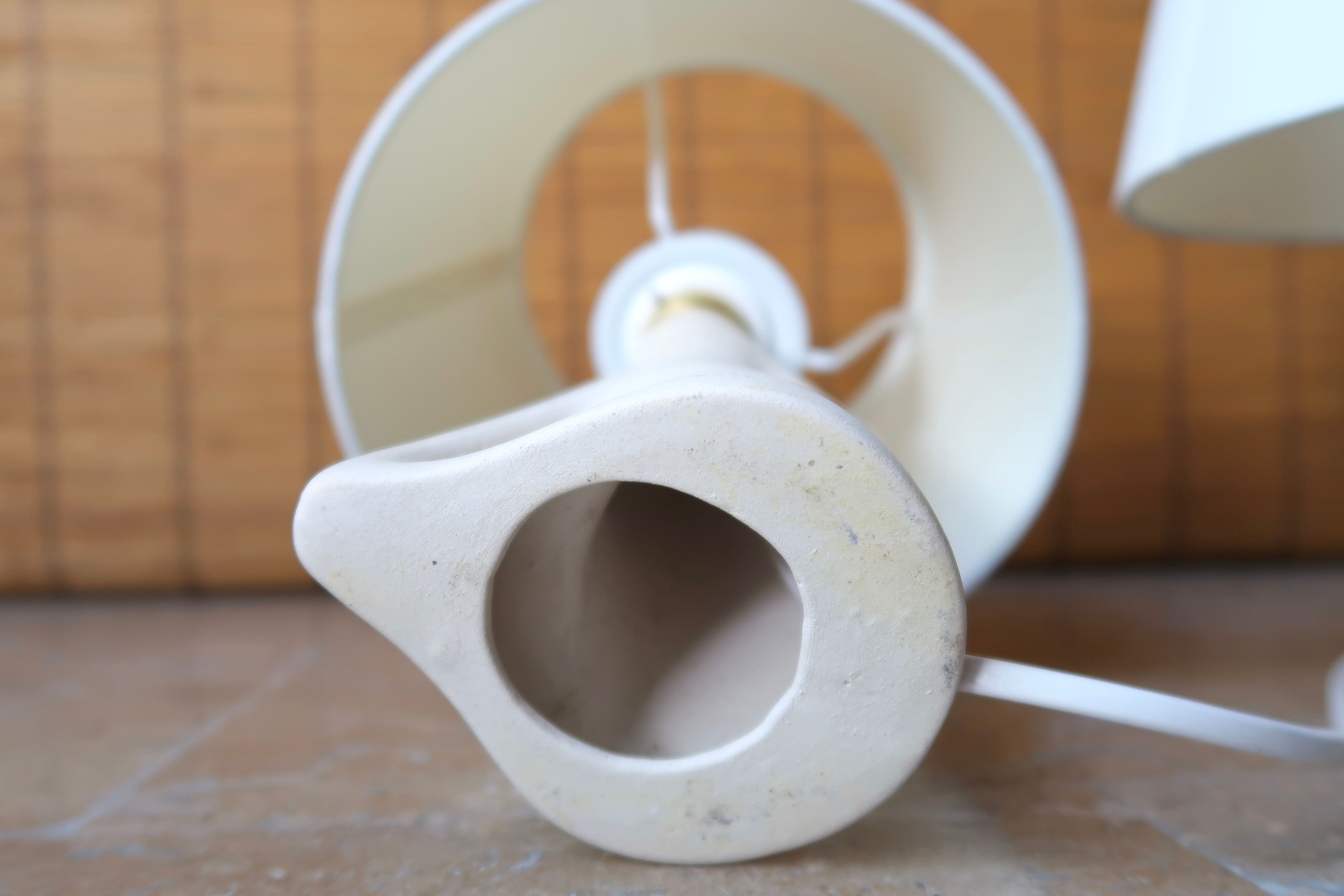 Pair of white ceramic lamps, 50s