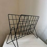 Black metal vinyl magazine rack design