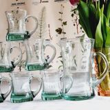 Set of 6 handle glasses and 1 puffed glass jug
