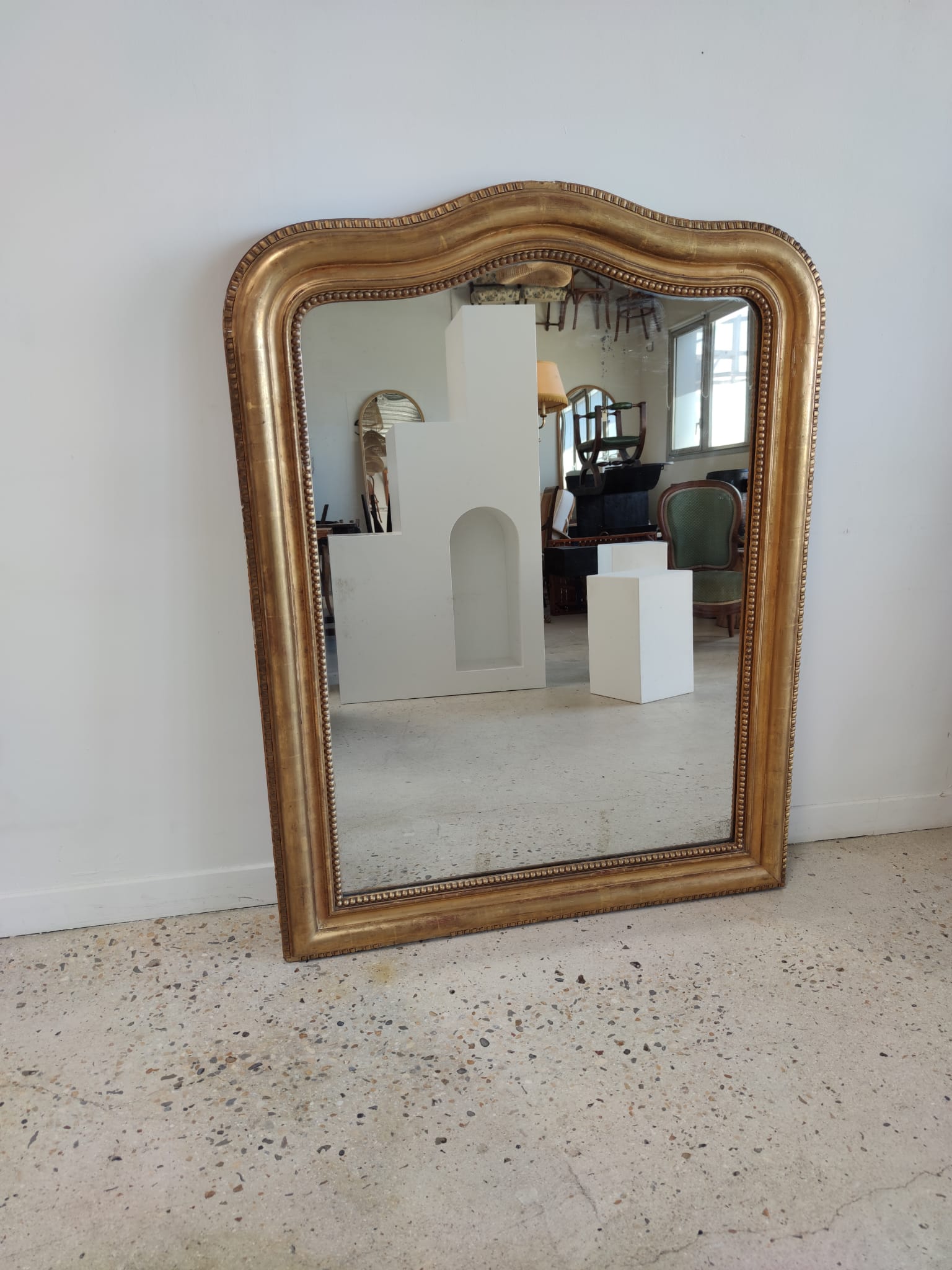 Louis Philippe gilded mirror with gendarme hat nineteenth H:130cm