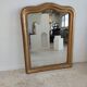 Louis Philippe gilded mirror with gendarme hat nineteenth H:130cm