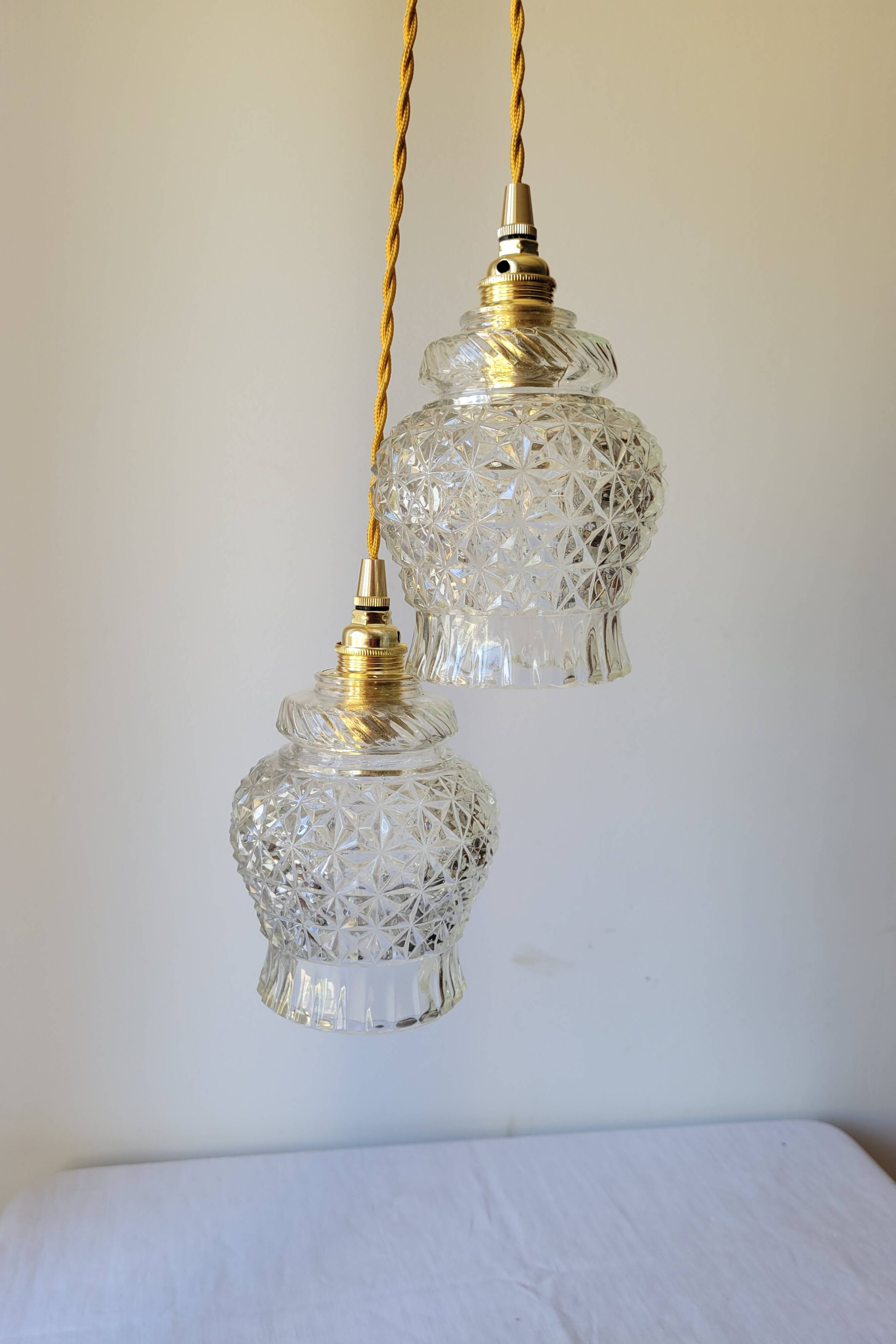 Duo of molded glass pendant lights