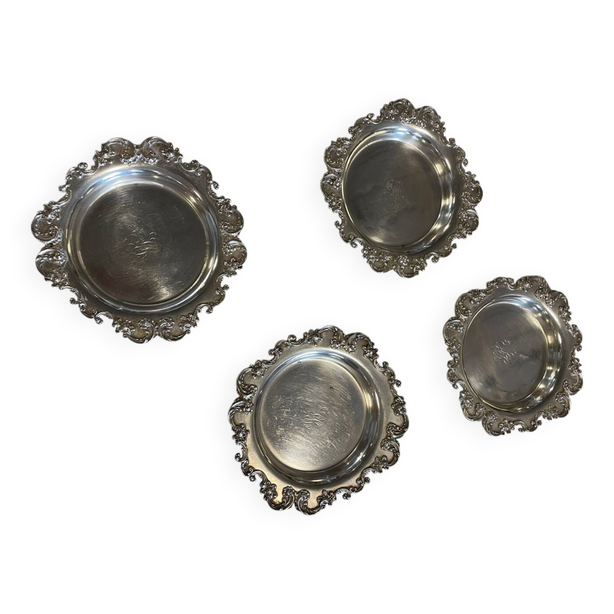 Set of 4 silver metal bottle coasters