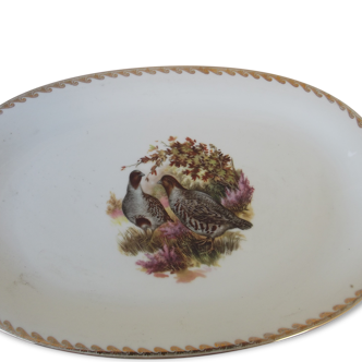 Flat oval signed Partridge winterling