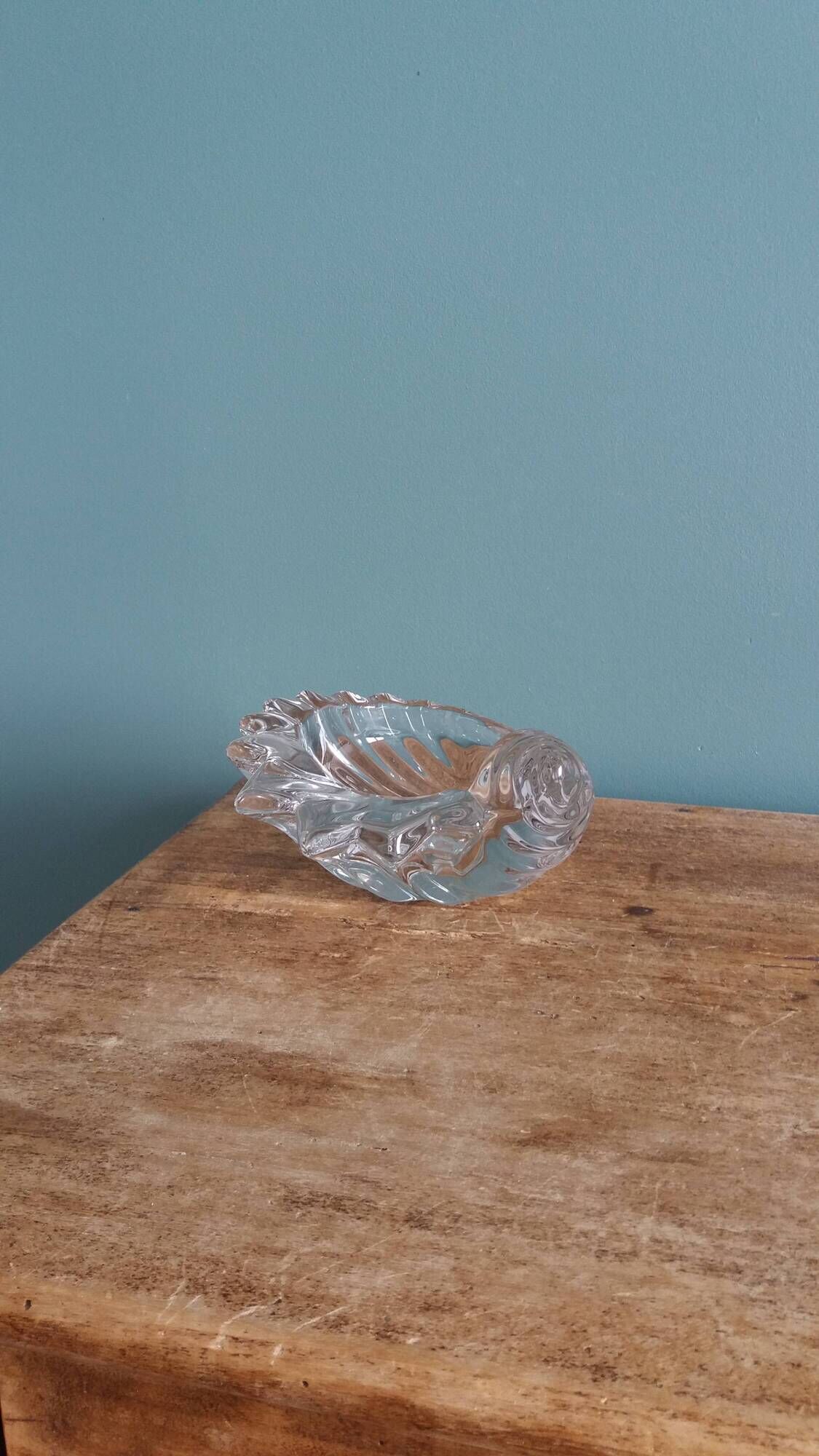 Shell-shaped crystal paperweight.